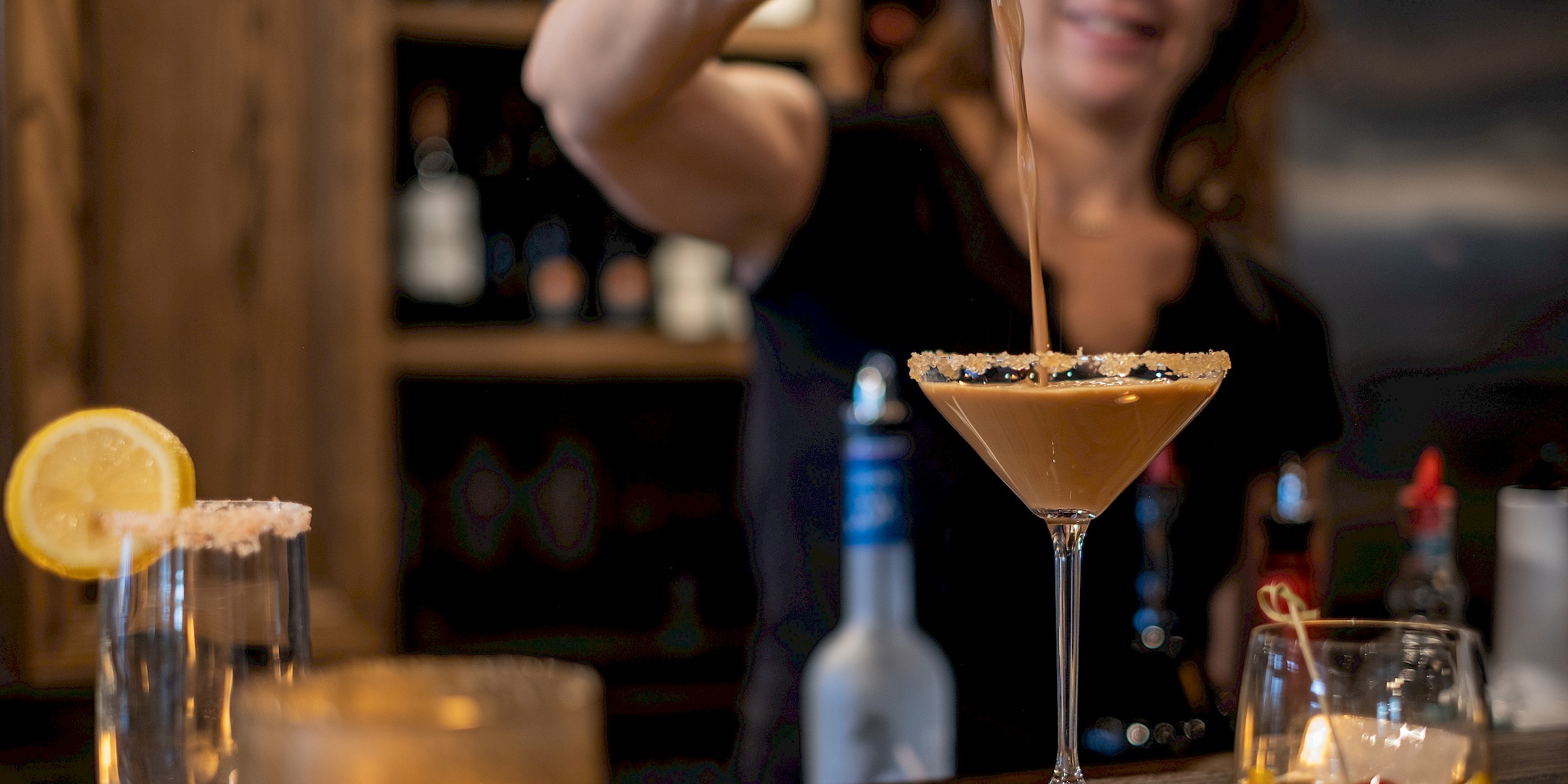 Bartender making cocktails. The Waypoint Restaurant and Bar