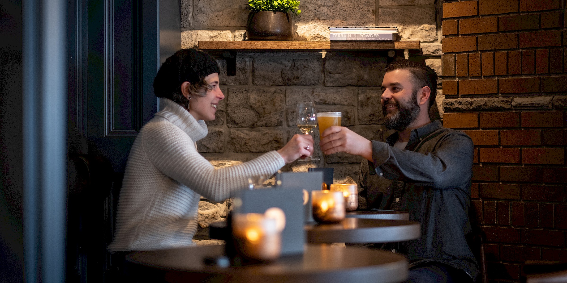 Couple dining at The Waypoint Restaurant and Bar at The Kaslo Hotel